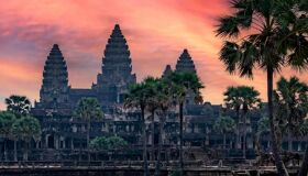 Iconic Angkor Wat towers in Cambodia for a vibrant Angkor Wat Tours banner with Legend Travel Group.